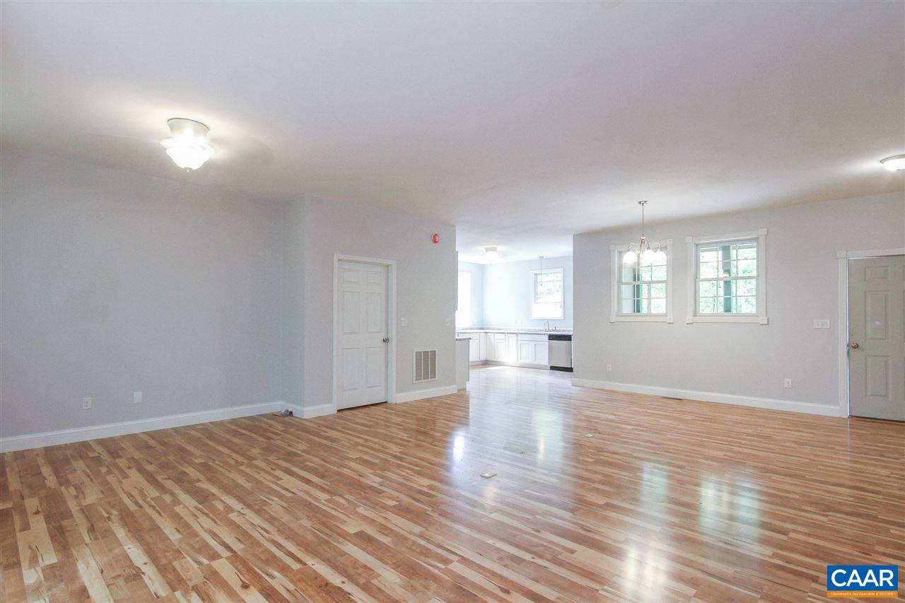 38 East Point Road Palmyra, VA 22963 - Photo 5 of 12 a view of empty room with wooden floor and fan