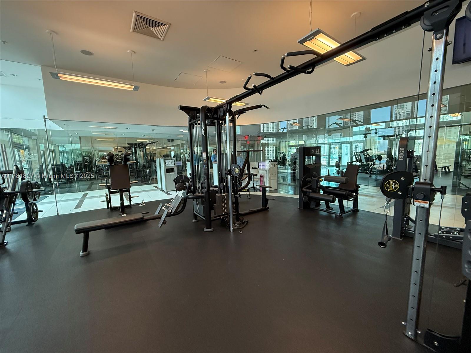 92 Southwest 3rd Street, Unit 4209 Miami, FL 33130 - Photo 22 of 31 a view of a room with gym equipment