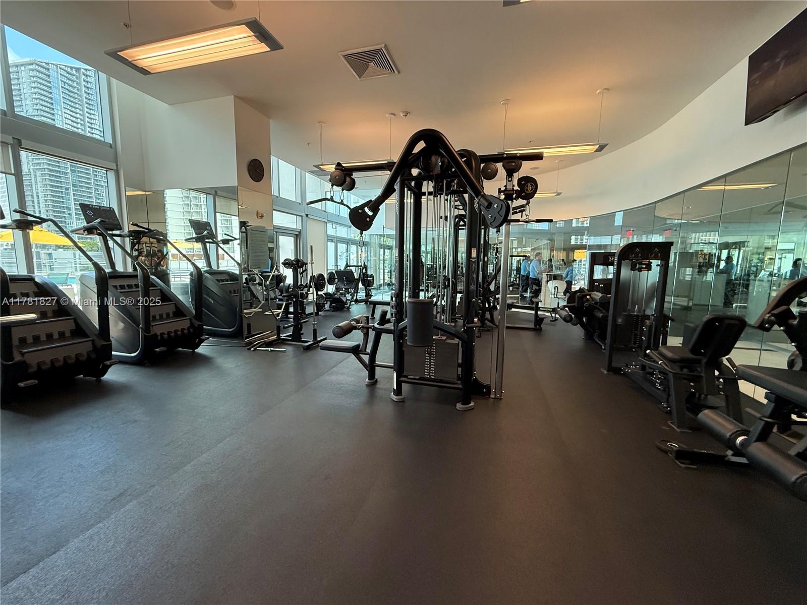 92 Southwest 3rd Street, Unit 4209 Miami, FL 33130 - Photo 27 of 31 a view of a room with gym equipment