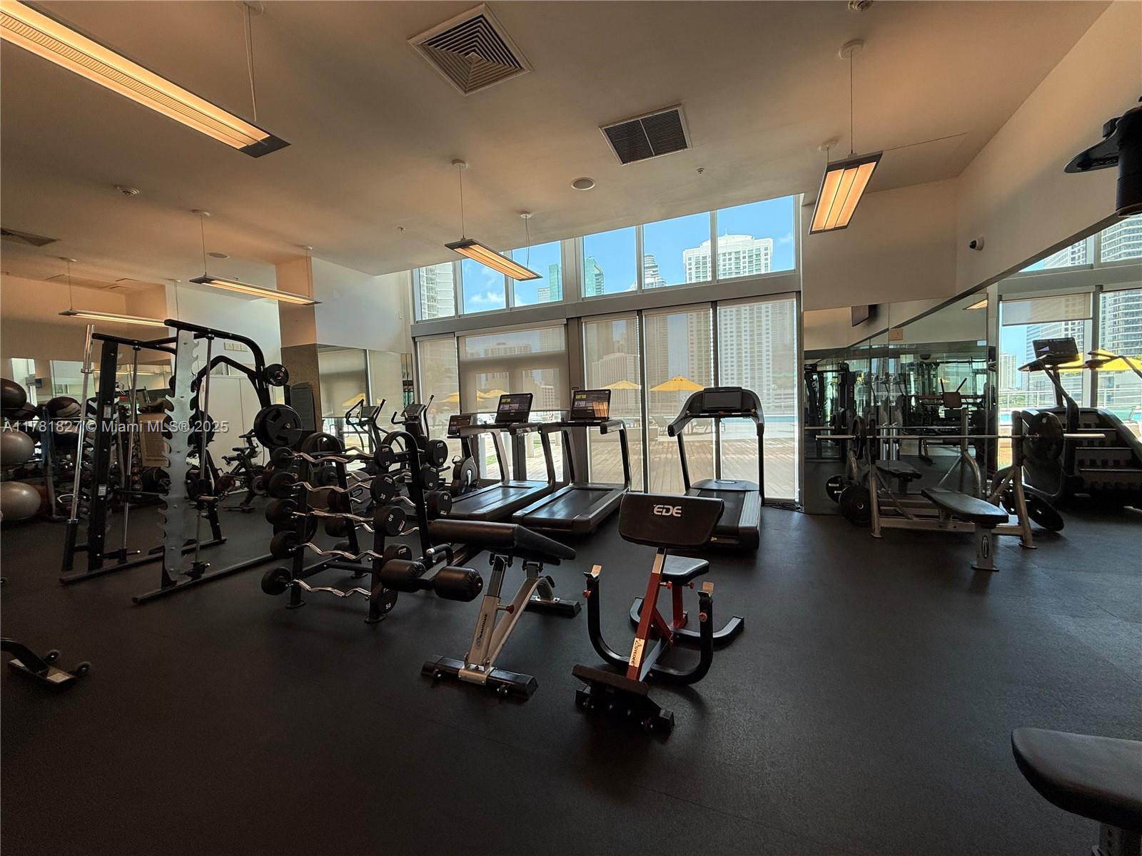 92 Southwest 3rd Street, Unit 4209 Miami, FL 33130 - Photo 29 of 31 a view of a room with gym equipment