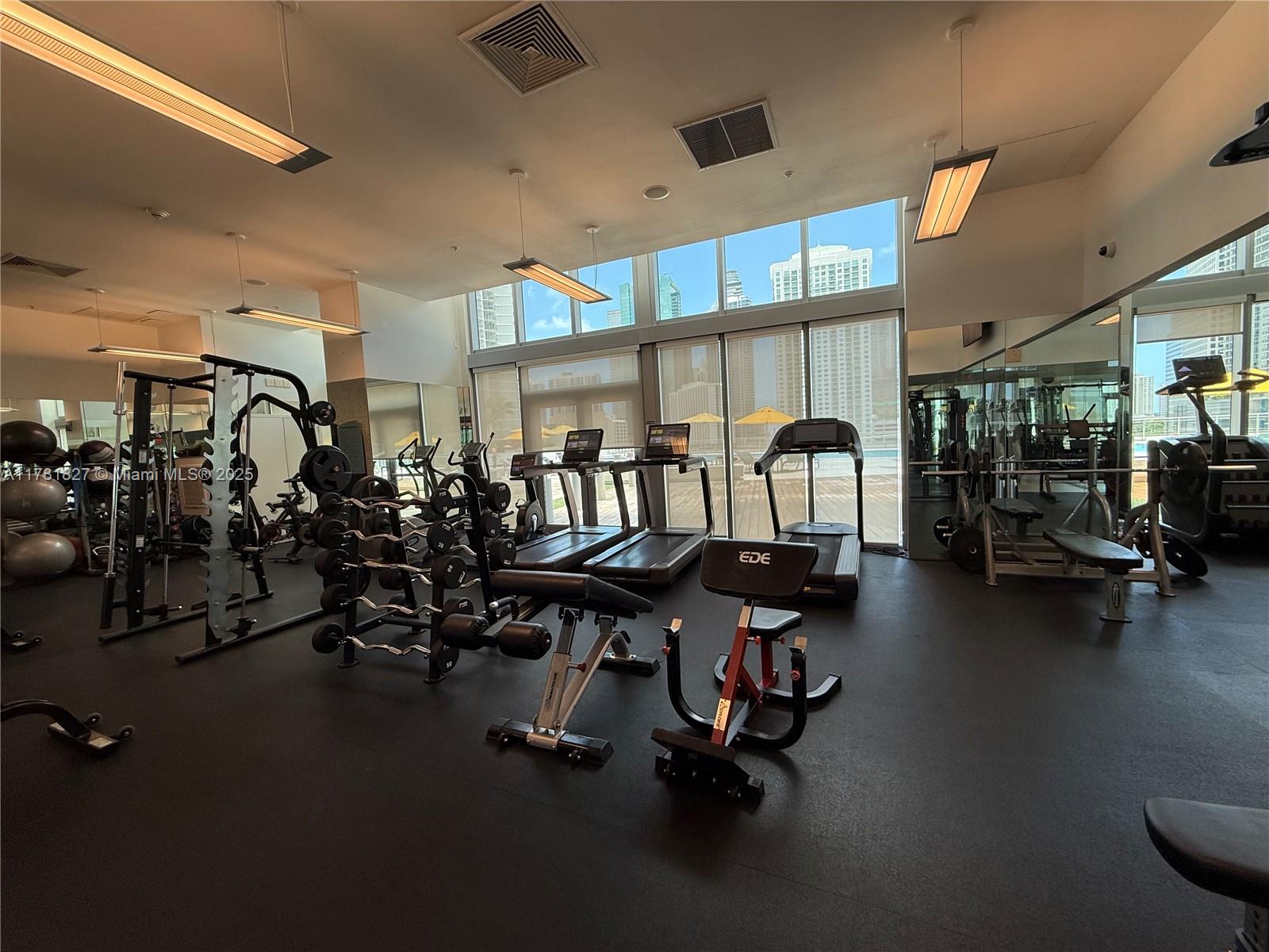 92 Southwest 3rd Street, Unit 4209 Miami, FL 33130 - Photo 30 of 31 a view of a room with gym equipment