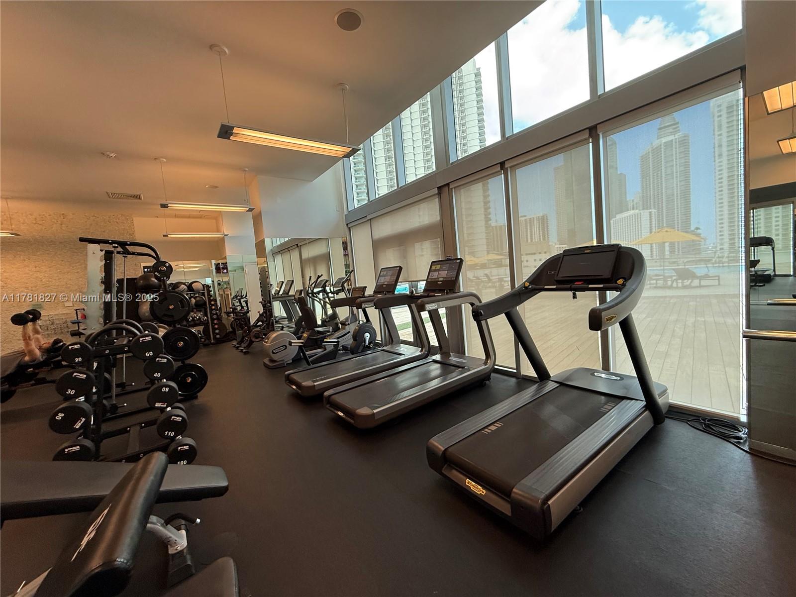 92 Southwest 3rd Street, Unit 4209 Miami, FL 33130 - Photo 31 of 31 a view of a room with gym equipment