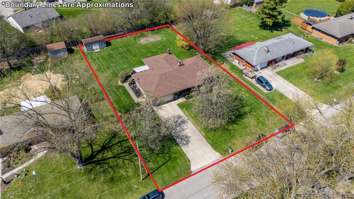 2945 Ashlar Drive Springfield, OH 45503 - Photo 19 of 20 This expansive property features a well-maintained lawn, a private driveway, fenced backyard and ample outdoor space. Property boundary shown.