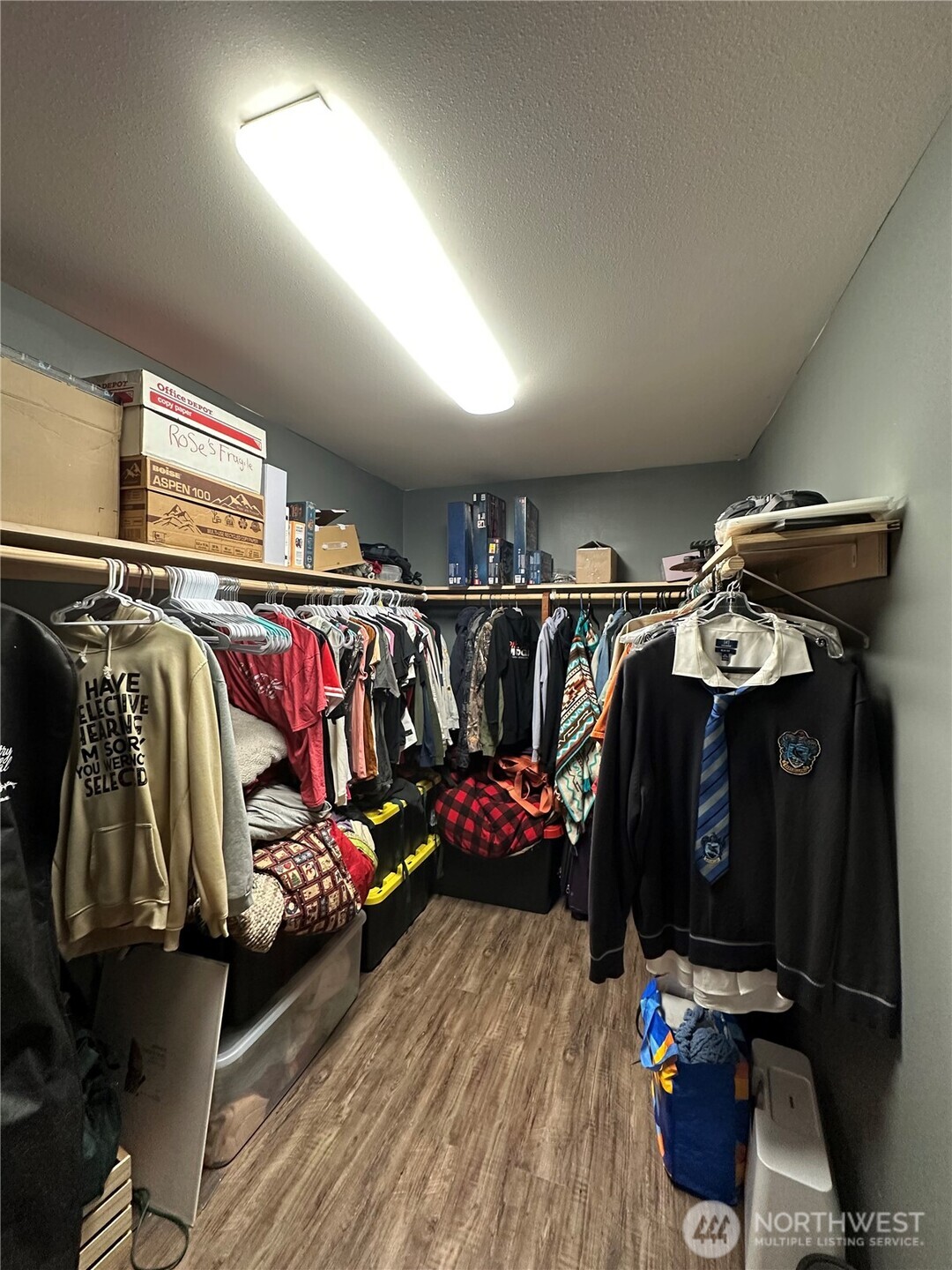180 A Mossyrock Road West Mossyrock, WA 98564 - Photo 20 of 27 a view of walk in closet with clothes and shoes