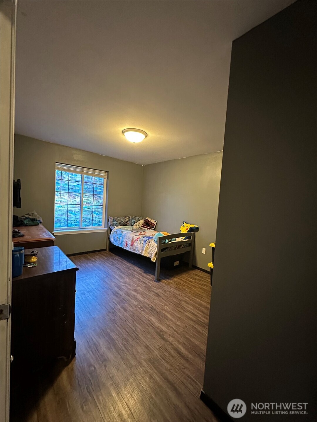 180 A Mossyrock Road West Mossyrock, WA 98564 - Photo 24 of 29 a bedroom with bed and window