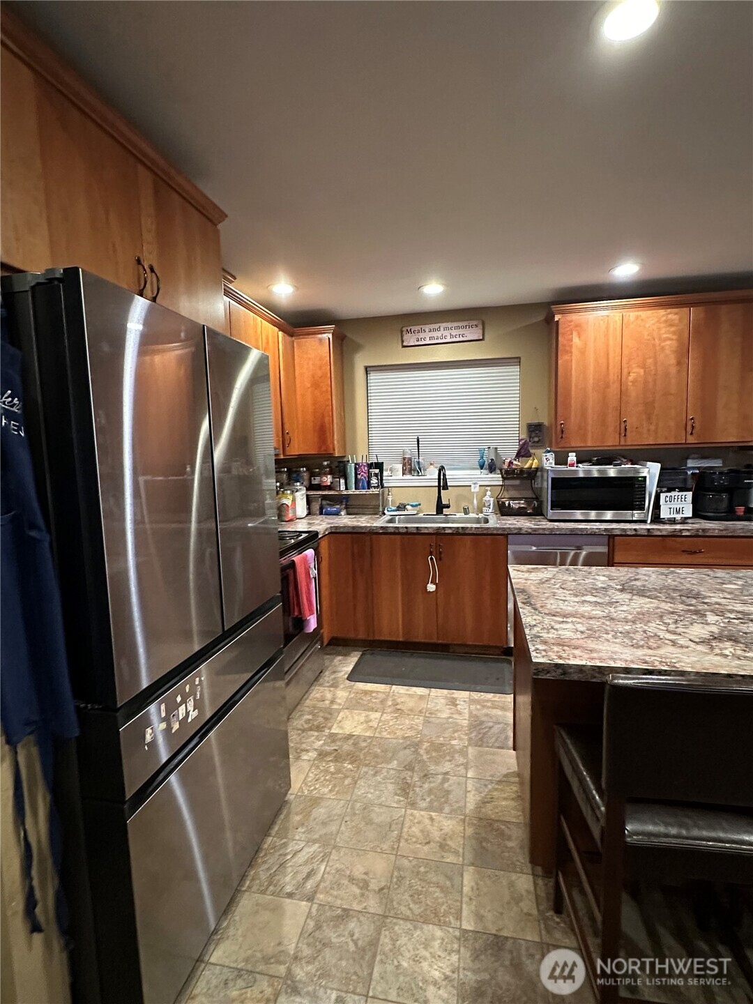 180 A Mossyrock Road West Mossyrock, WA 98564 - Photo 9 of 29 a kitchen with stainless steel appliances granite countertop a sink refrigerator and cabinets