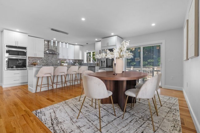 321 Albemarle Road Newton, MA 02460 - Photo 12 of 34 a view of a dining room with furniture
