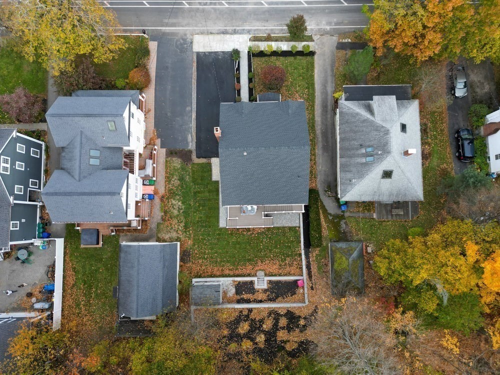 321 Albemarle Road Newton, MA 02460 - Photo 34 of 34 an aerial view of a house with a yard