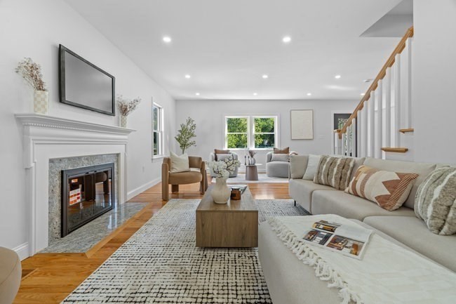 321 Albemarle Road Newton, MA 02460 - Photo 8 of 34 a living room with furniture and a fireplace