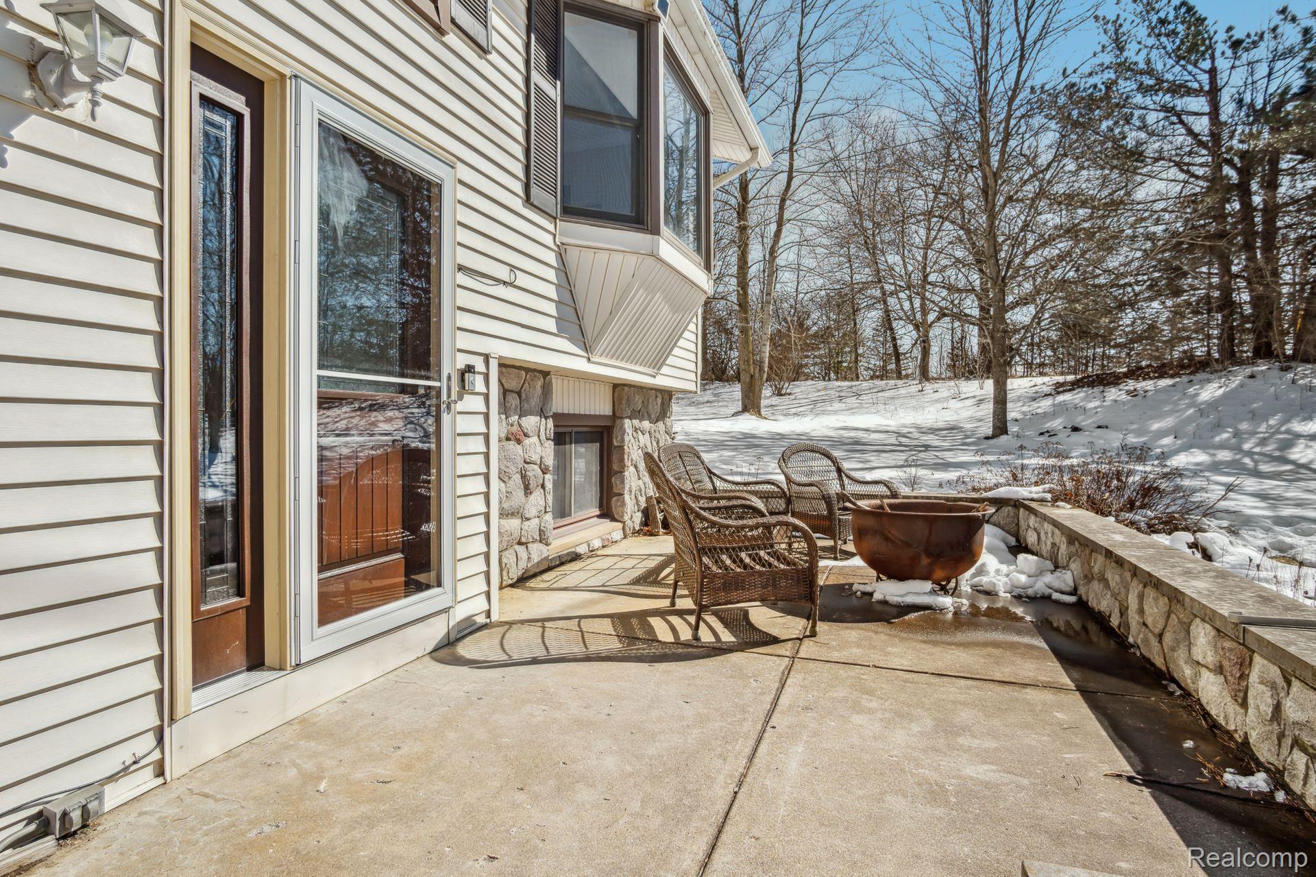 2718 Sexton Road Howell, MI 48843 - Photo 2 of 30 Front entry with patio