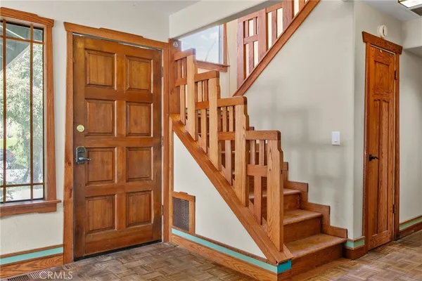 a view of front door with stairs