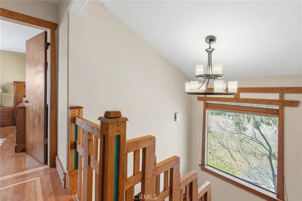 a view of a house with backyard porch and sitting area