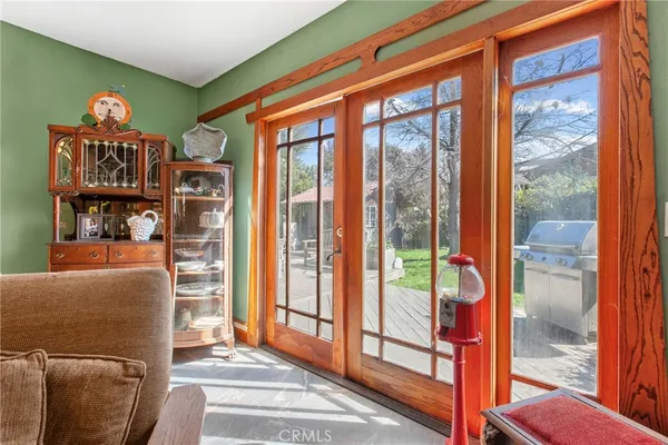 a view of a livingroom with furniture and windows