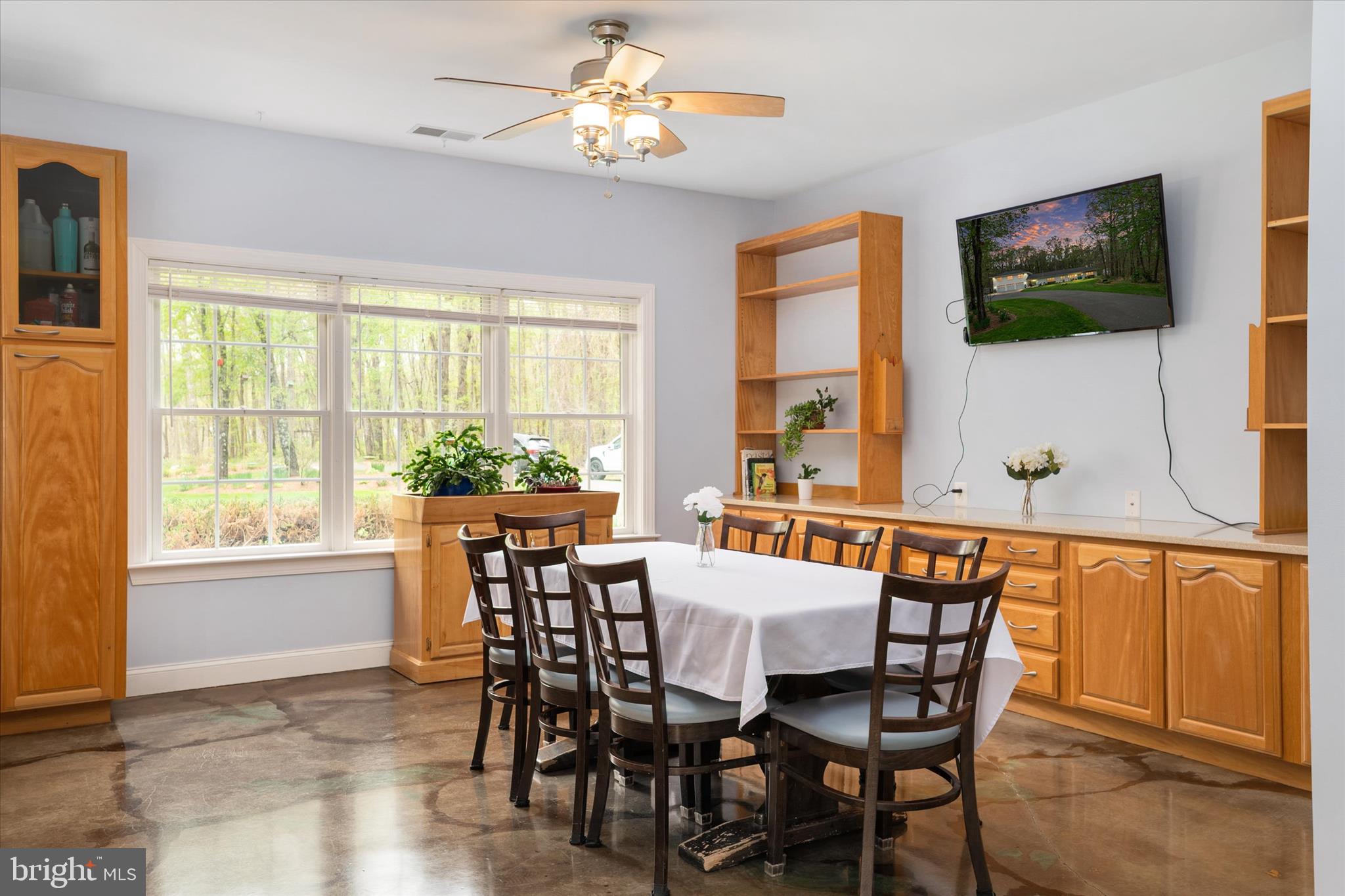 730 Central Avenue East Edgewater, MD 21037 - Photo 16 of 63 a view of a dining room with furniture window and outside view