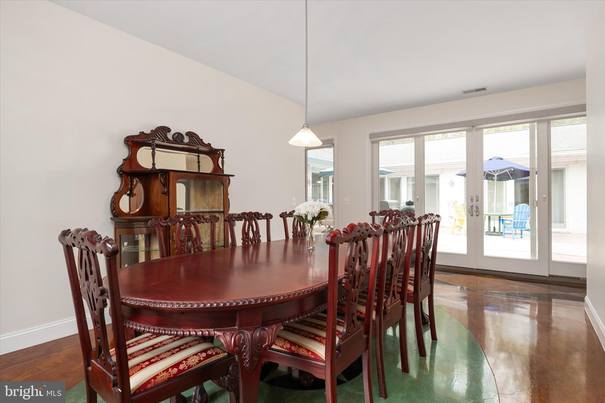 730 Central Avenue East Edgewater, MD 21037 - Photo 17 of 63 a dining room with furniture window and wooden floor