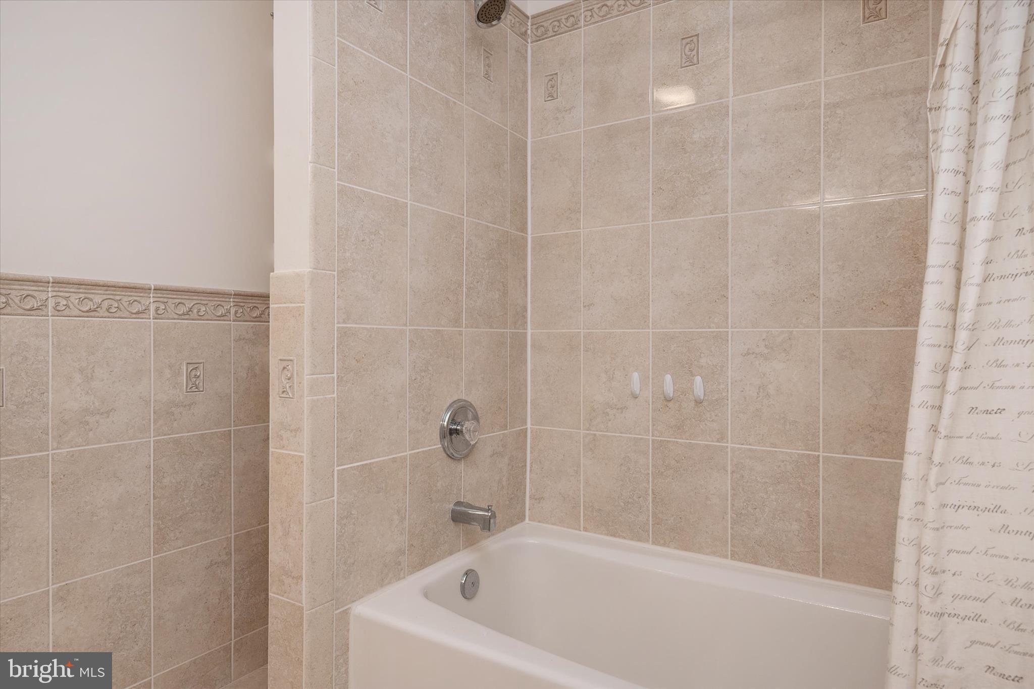 730 Central Avenue East Edgewater, MD 21037 - Photo 30 of 63 a bathroom with a bathtub