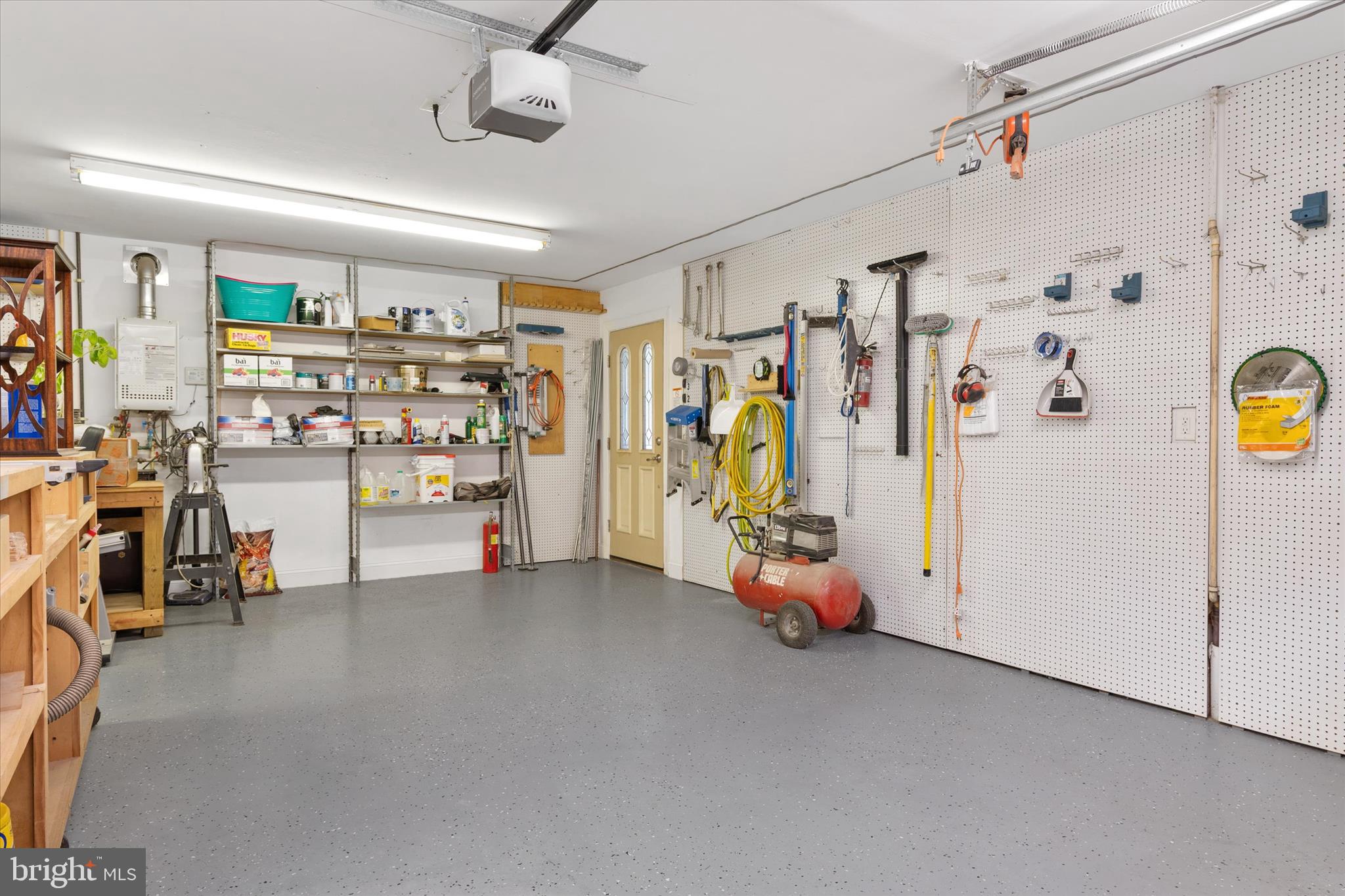 730 Central Avenue East Edgewater, MD 21037 - Photo 40 of 63 Spacious garage with plenty of extra space