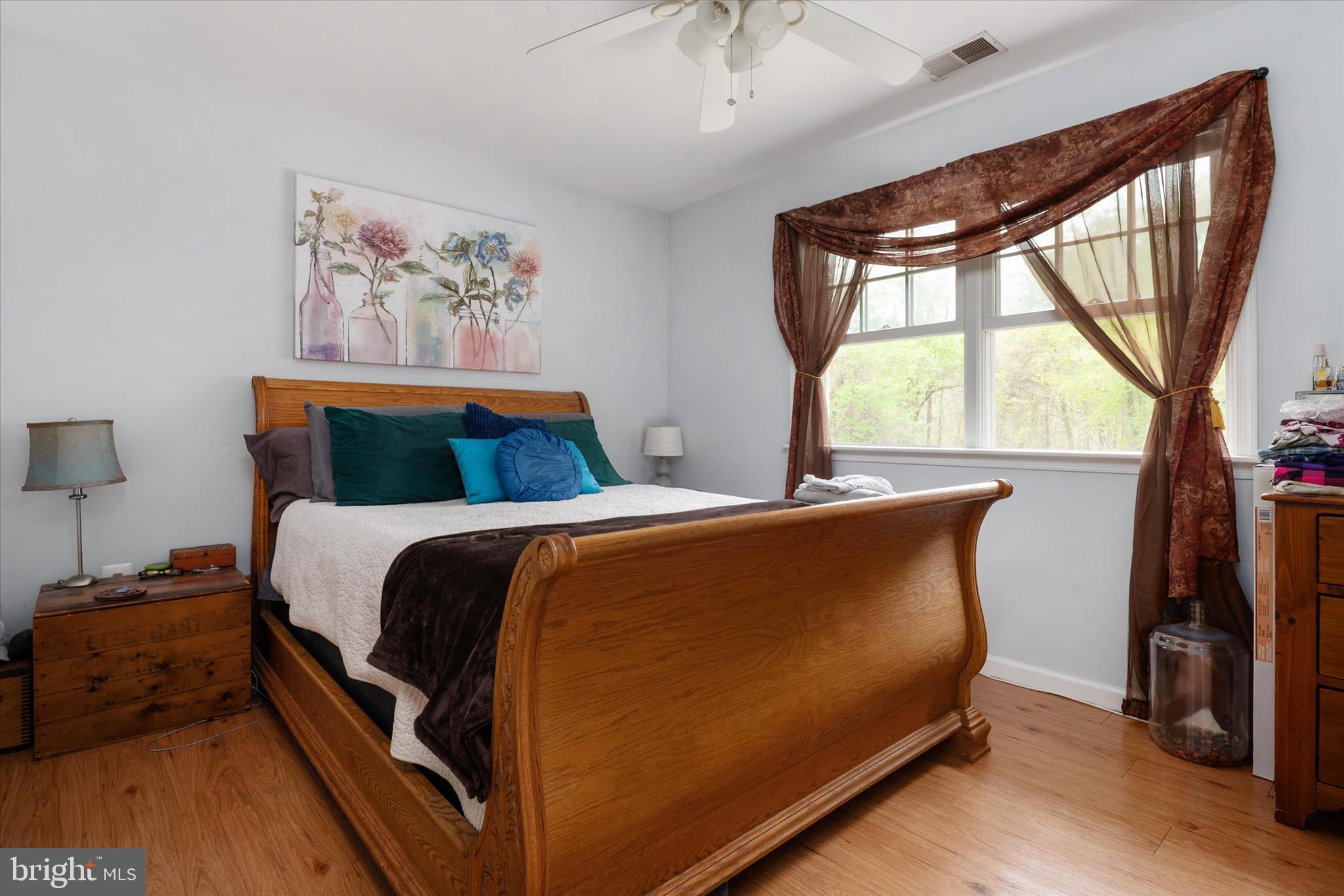 730 Central Avenue East Edgewater, MD 21037 - Photo 45 of 63 a bed sitting in a bedroom next to a window