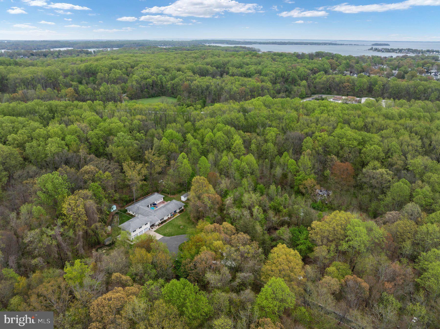 730 Central Avenue East Edgewater, MD 21037 - Photo 55 of 63 an aerial view of residential houses with outdoor space and trees
