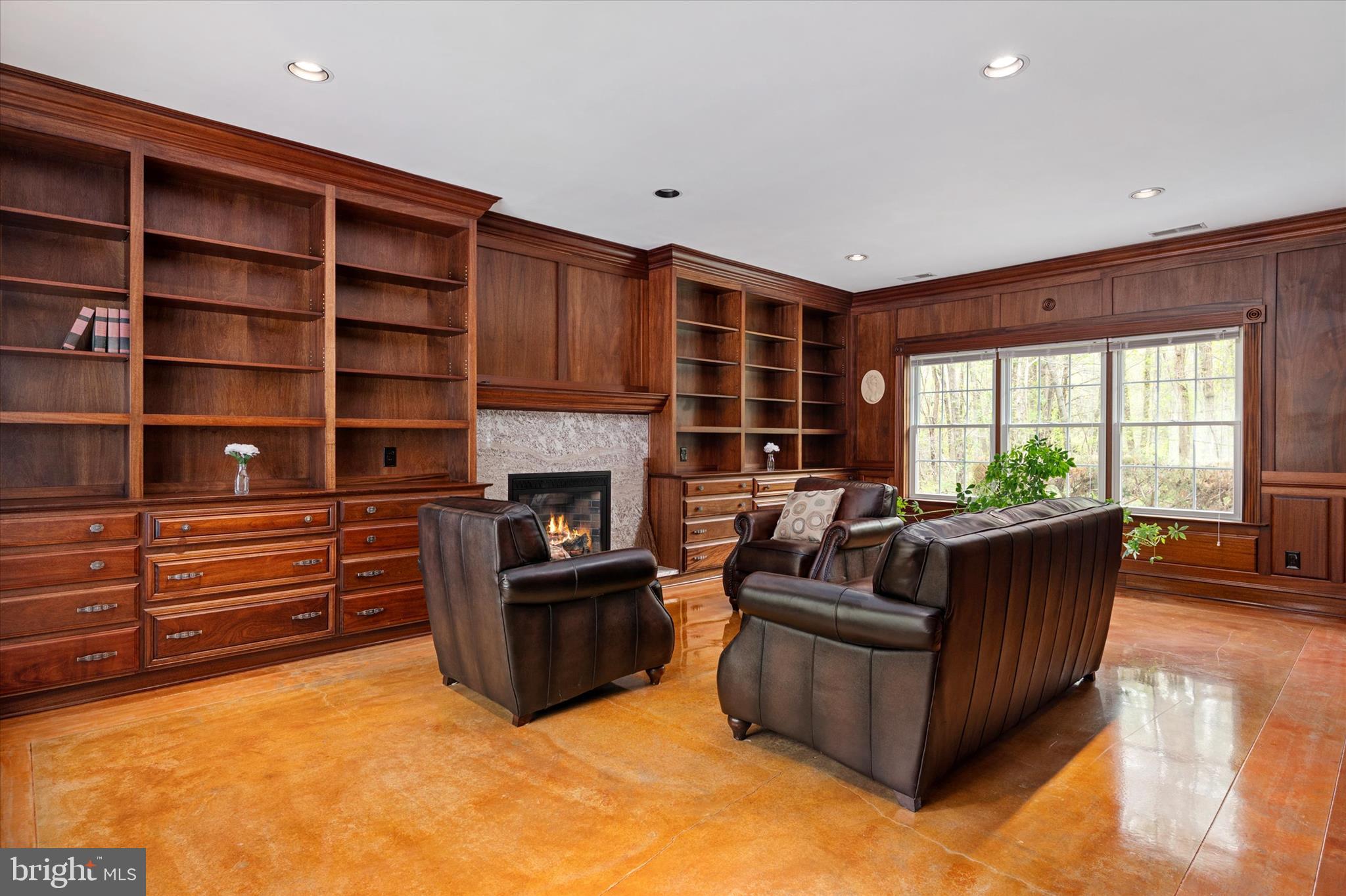 730 Central Avenue East Edgewater, MD 21037 - Photo 8 of 63 a living room with furniture and a fireplace