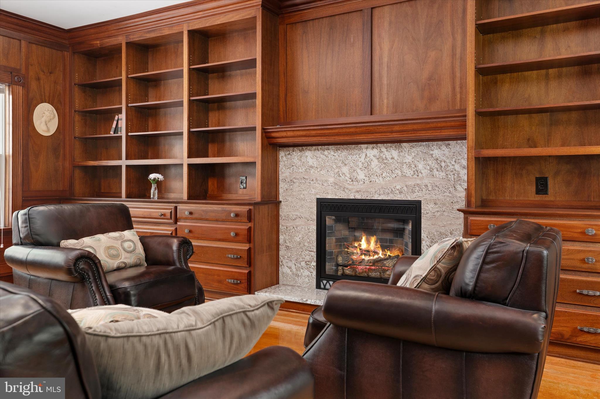 730 Central Avenue East Edgewater, MD 21037 - Photo 10 of 63 Gas fireplace with stone surround