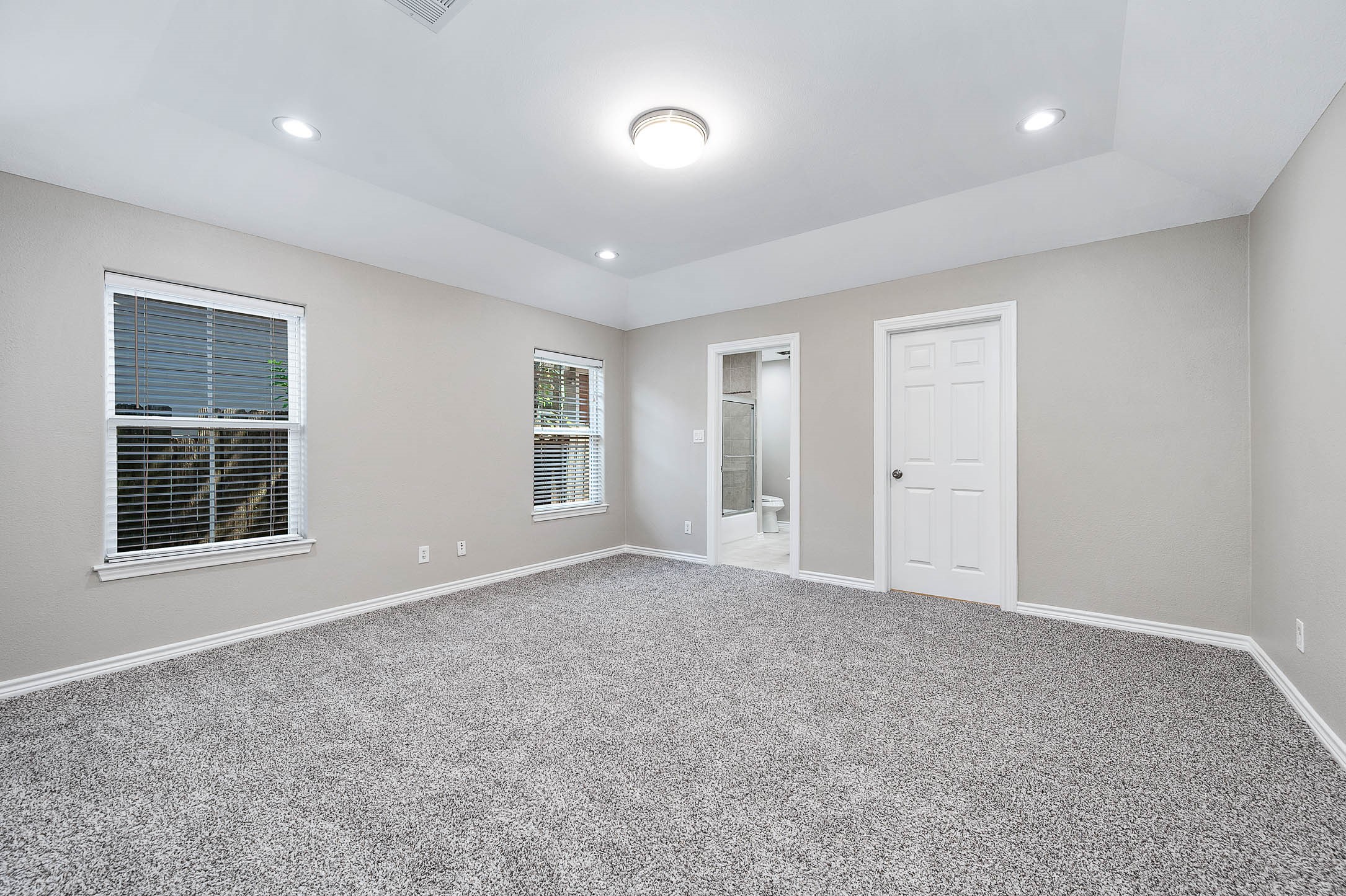 7308 Avenue R Galveston, TX 77551 - Photo 18 of 24 a view of an empty room with a window