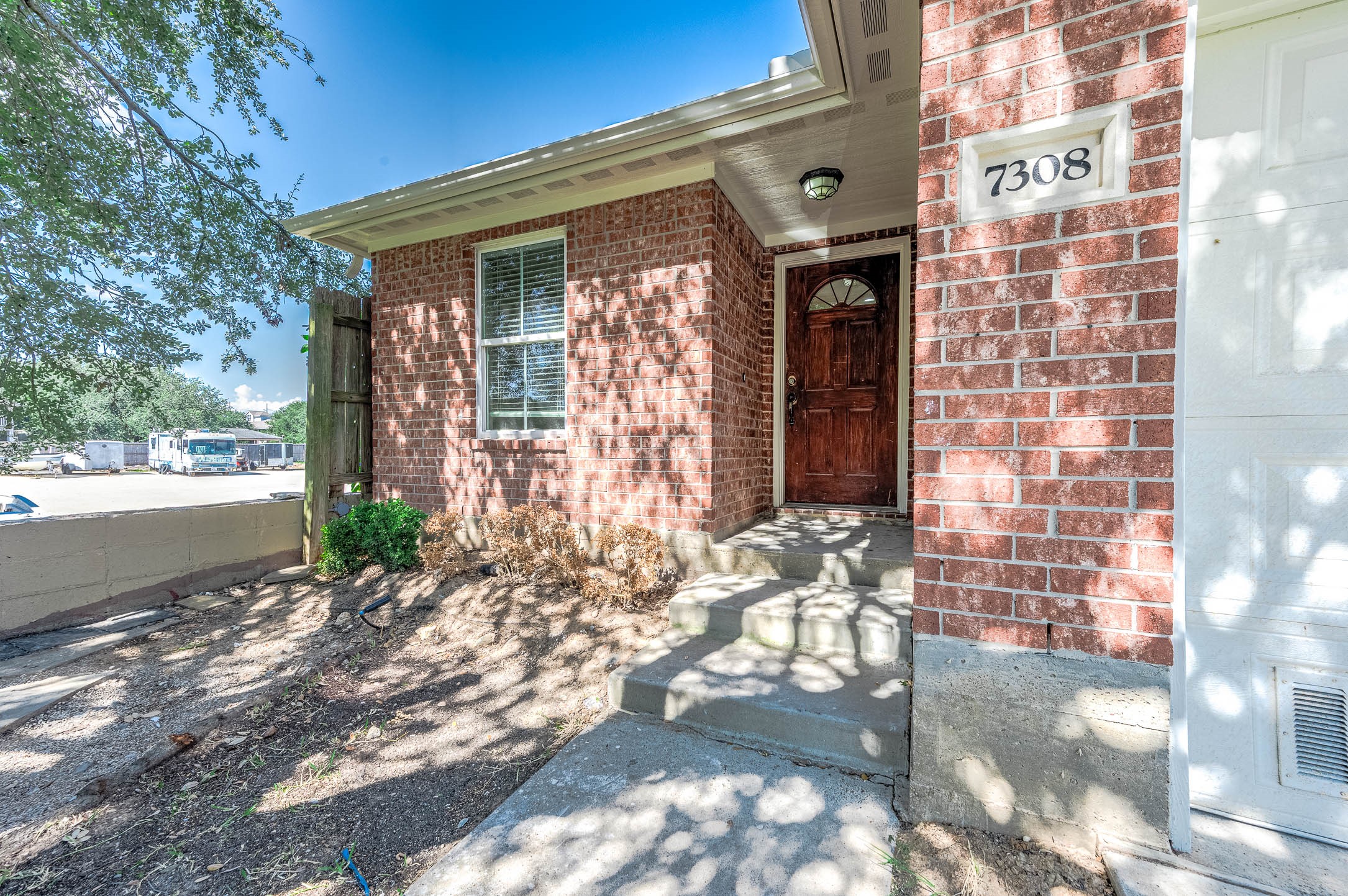 7308 Avenue R Galveston, TX 77551 - Photo 4 of 24 a front view of a house