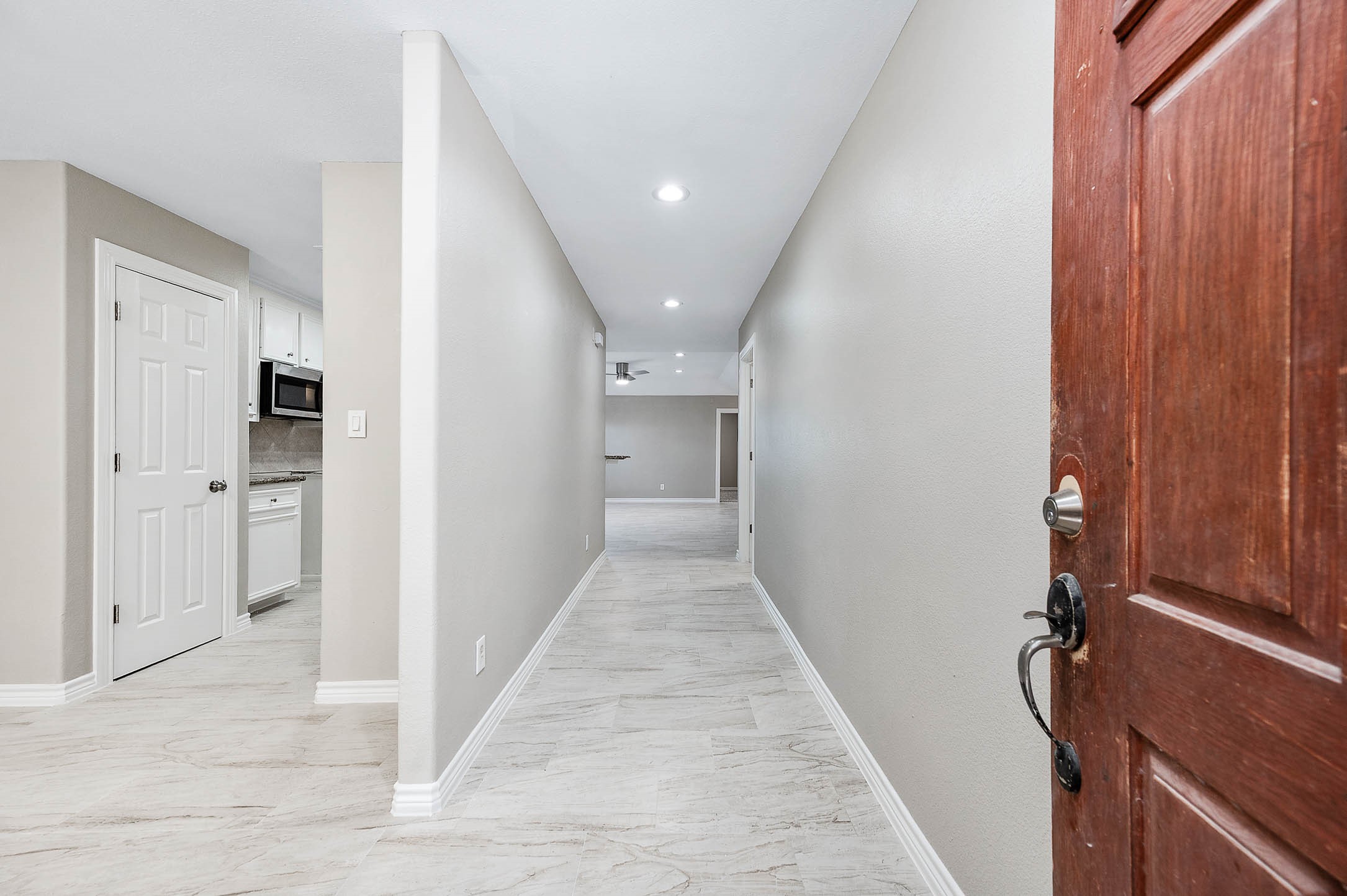 7308 Avenue R Galveston, TX 77551 - Photo 5 of 24 wooden floor in a gallery