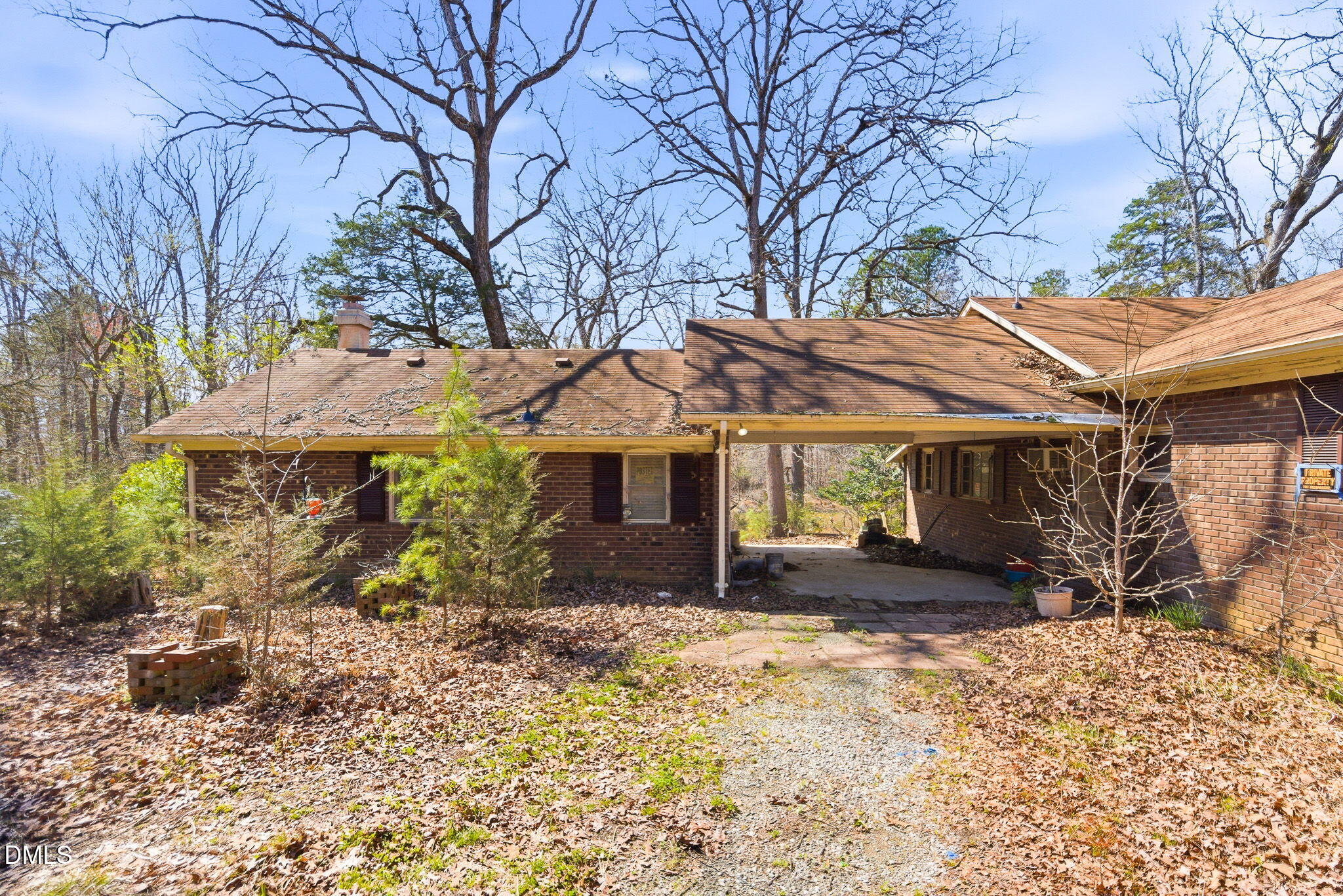 1603 Sykes Road Mebane, NC 27302 - Photo 3 of 45 a front view of a house with a yard and garage