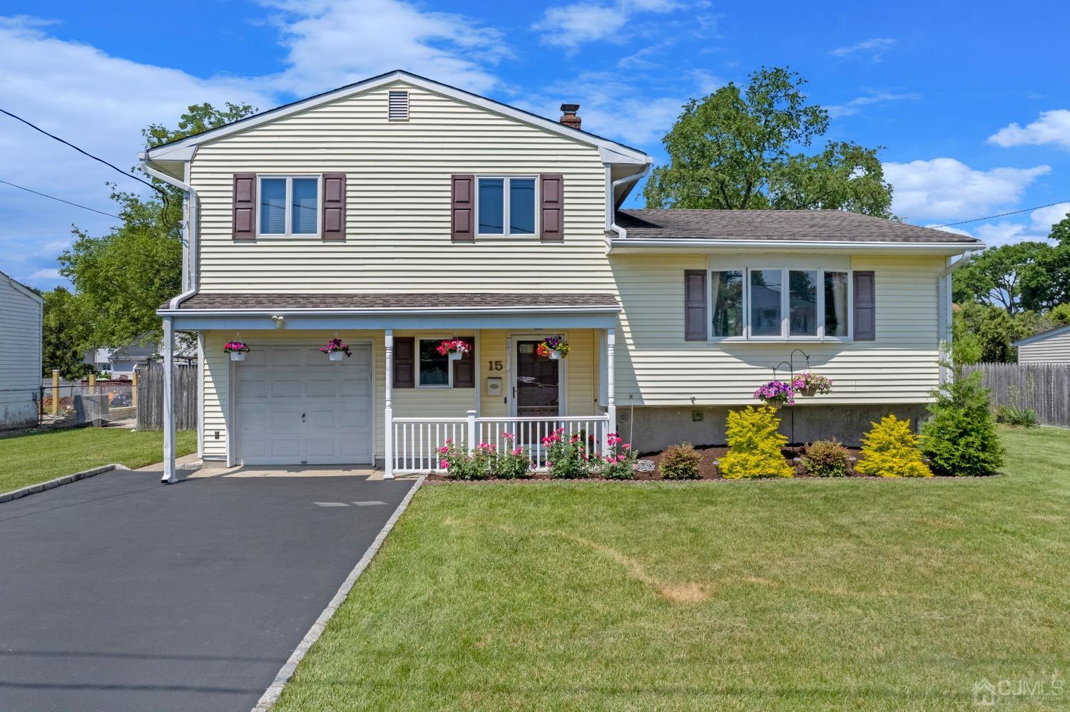 15 Brian Road Edison, NJ 08817 - Photo 1 of 19 a front view of a house with a yard
