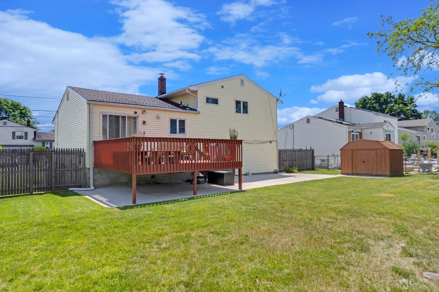 15 Brian Road Edison, NJ 08817 - Photo 12 of 19 a view of a house with a yard and sitting area