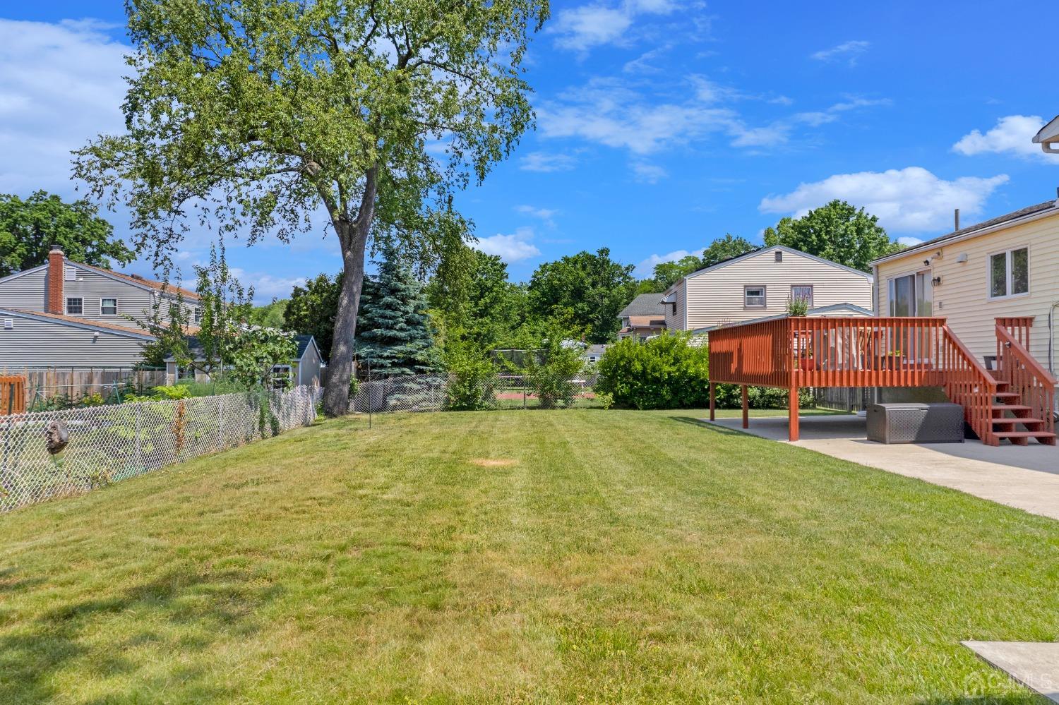 15 Brian Road Edison, NJ 08817 - Photo 14 of 19 a view of a house with a yard and sitting area