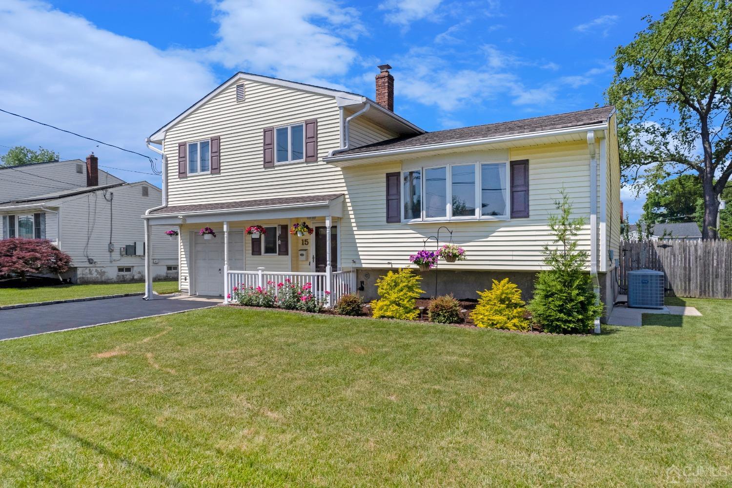 15 Brian Road Edison, NJ 08817 - Photo 2 of 19 a front view of a house with a yard