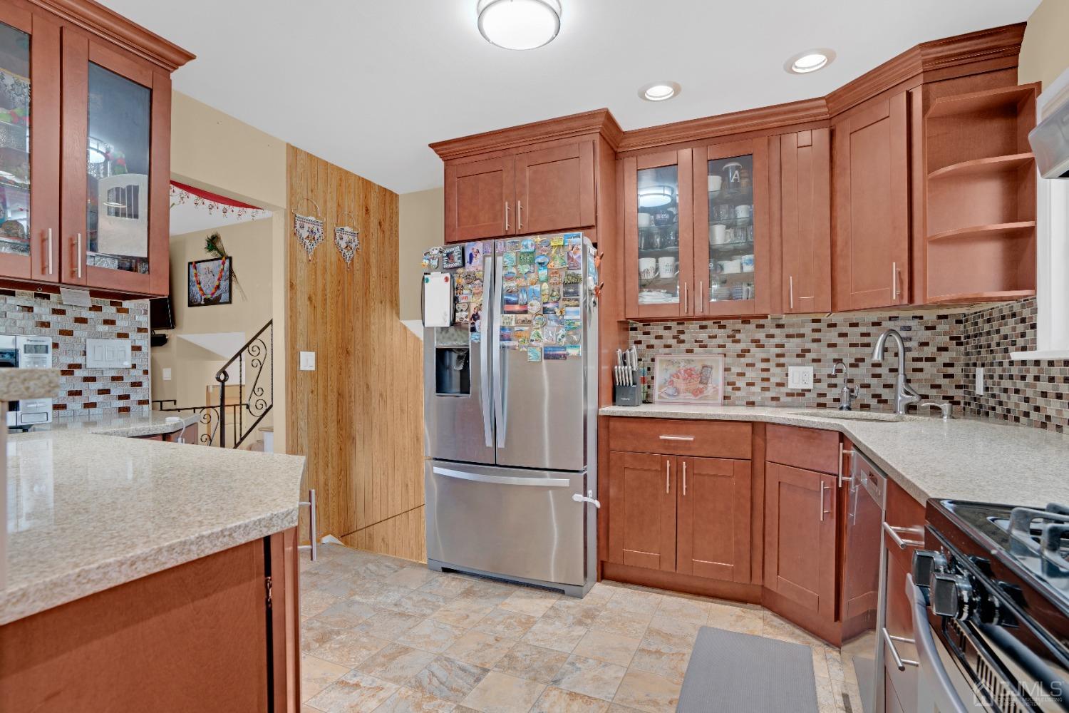 15 Brian Road Edison, NJ 08817 - Photo 8 of 19 a kitchen with stainless steel appliances granite countertop a refrigerator and a sink