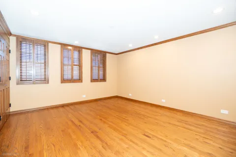 a bathroom with a granite countertop toilet a sink and a mirror