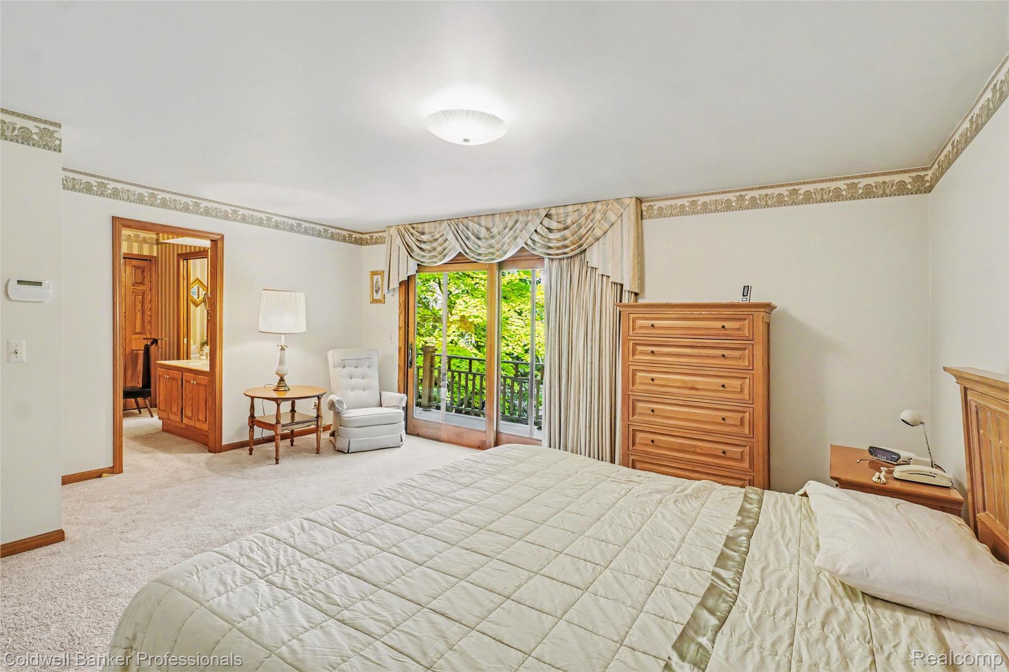 3583 Mitchell Road Metamora, MI 48455 - Photo 33 of 58 Broadloom carpeted bedroom featuring a sliding glass door with balcony access