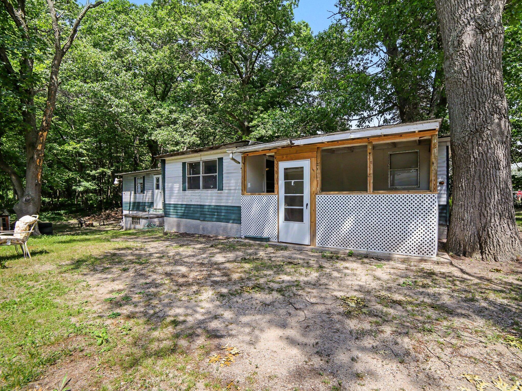 5648 West Johnson Road Ludington, MI 49431 - Photo 3 of 22 Side of House
