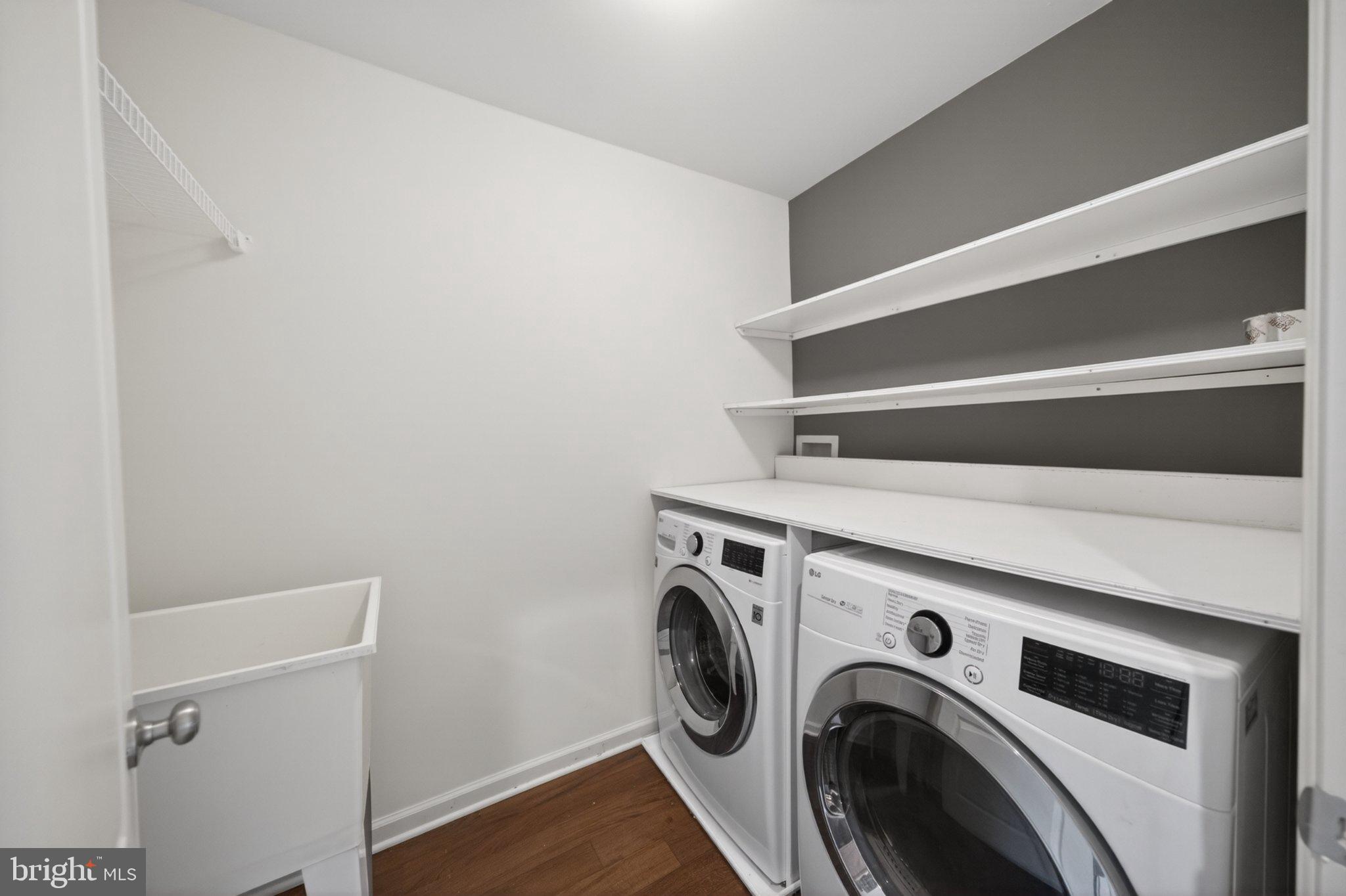 8475 Randell Ridge Road Frederick, MD 21704 - Photo 25 of 36 Modern laundry space with sleek appliances.