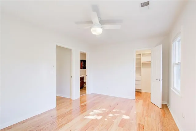 a view of an empty walk in closet