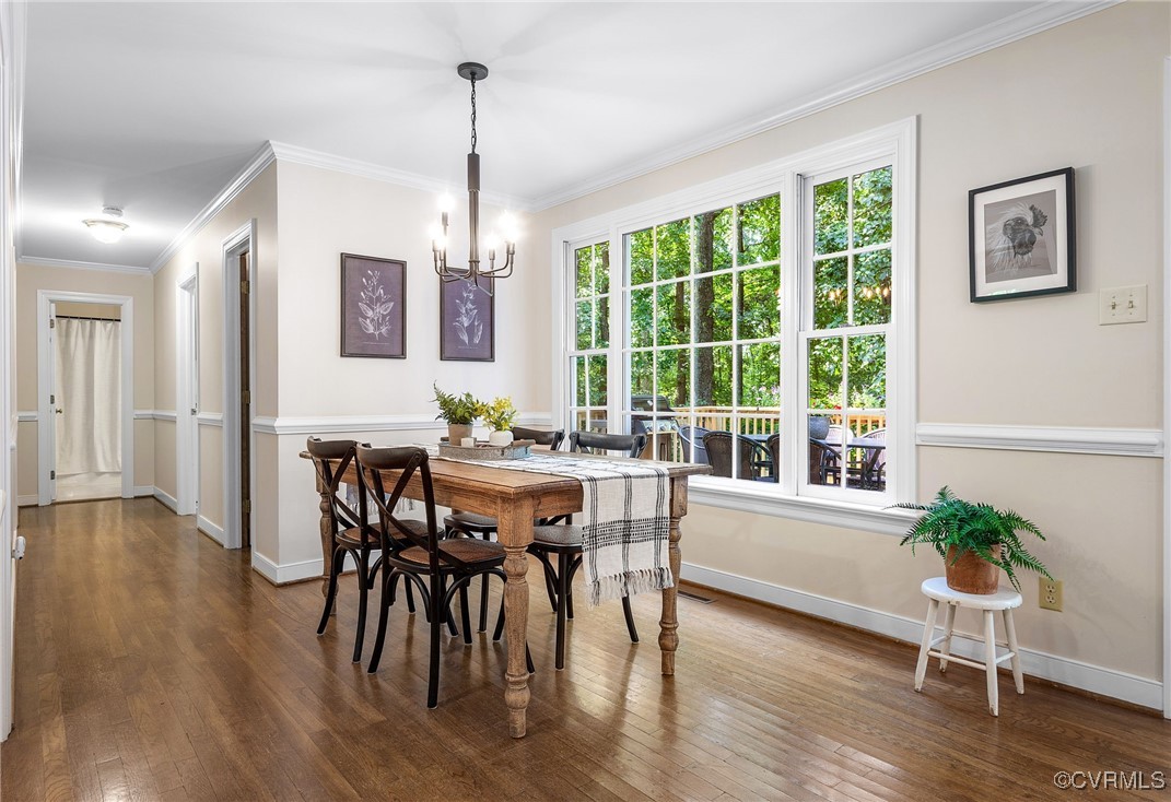 14471 West Salisbury Road Midlothian, VA 23113 - Photo 11 of 46 a view of a dining room with furniture window and wooden floor