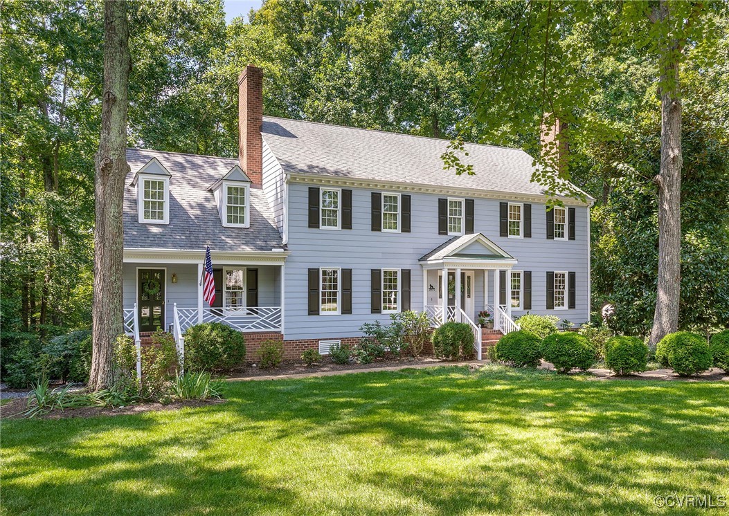 14471 West Salisbury Road Midlothian, VA 23113 - Photo 2 of 46 a front view of a house with a garden