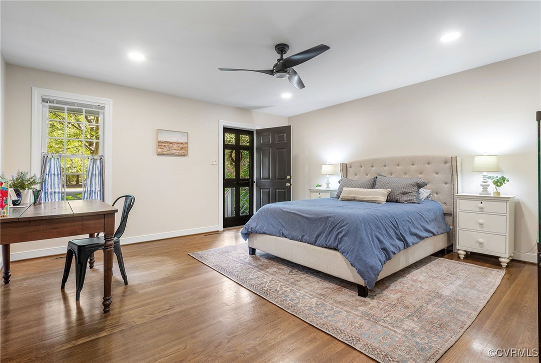 14471 West Salisbury Road Midlothian, VA 23113 - Photo 22 of 46 a bedroom with a bed and a table in it