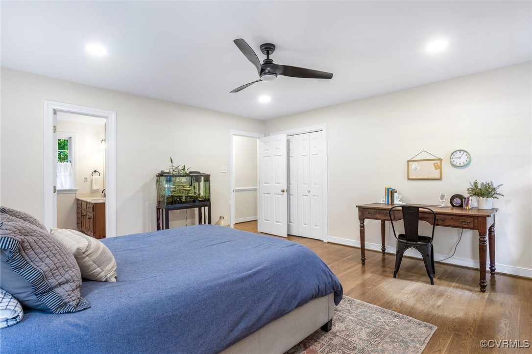14471 West Salisbury Road Midlothian, VA 23113 - Photo 23 of 46 a bedroom with a bed and a table in it