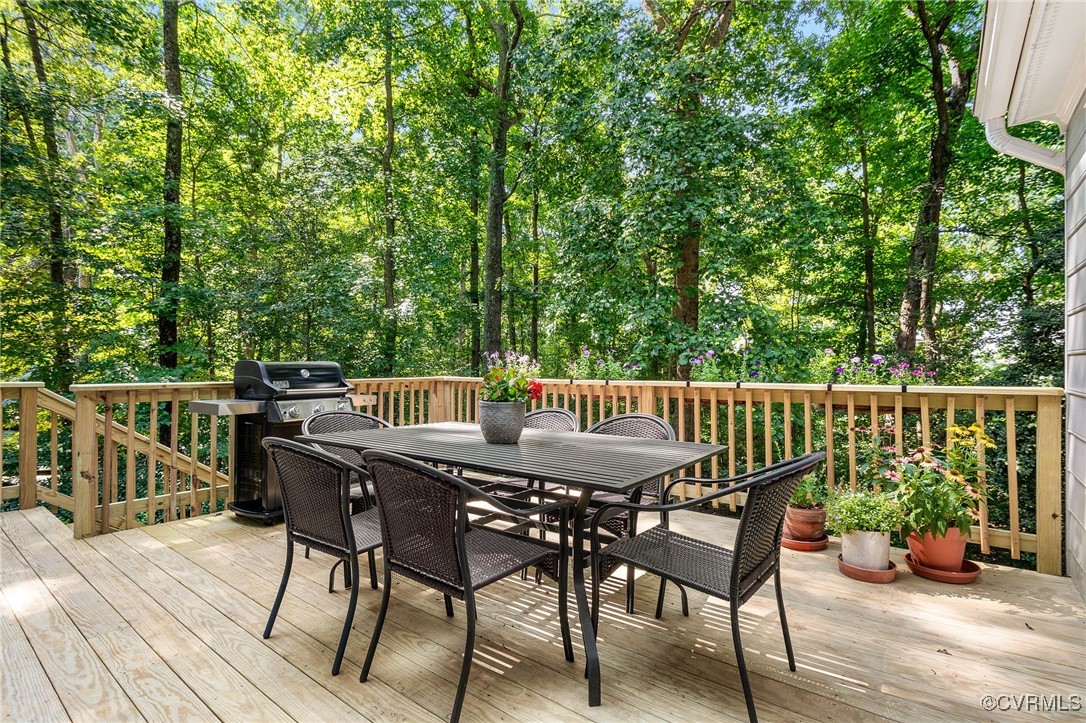 14471 West Salisbury Road Midlothian, VA 23113 - Photo 40 of 46 a view of a deck with furniture and trees