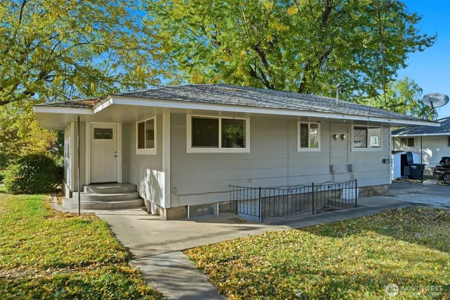 a front view of a house with a porch