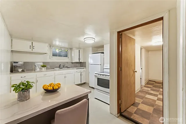 a bathroom with a sink and vanity