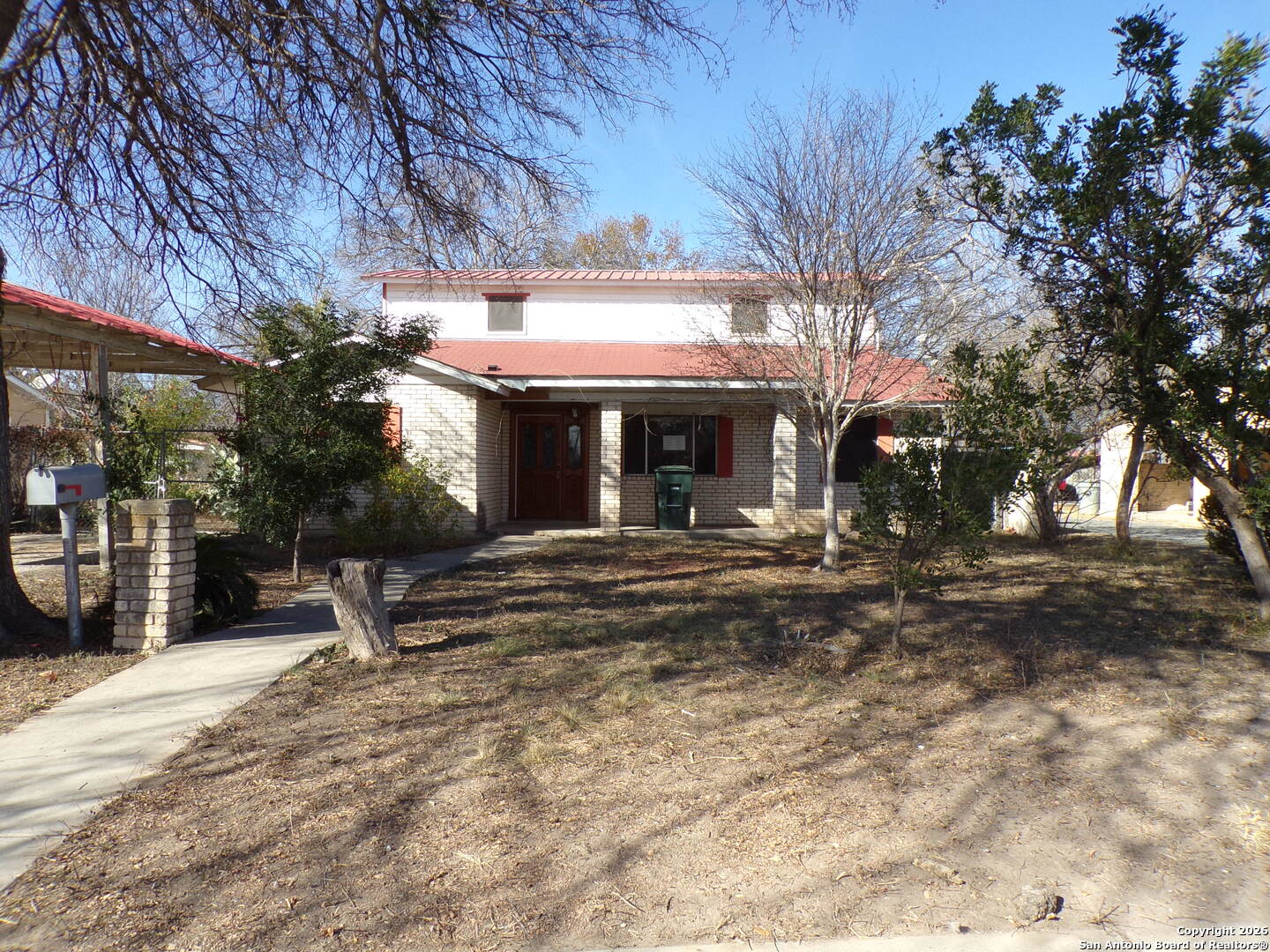 a view of a house with a park
