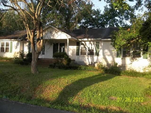 410 Burnett Ferry Road Southwest Rome, GA 30165 - Photo 1 of 1 front view of a house with a yard