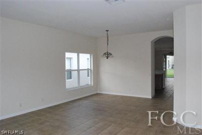 8876 Falcon Pointe Loop Fort Myers, FL 33912 - Photo 3 of 3 an empty room with windows
