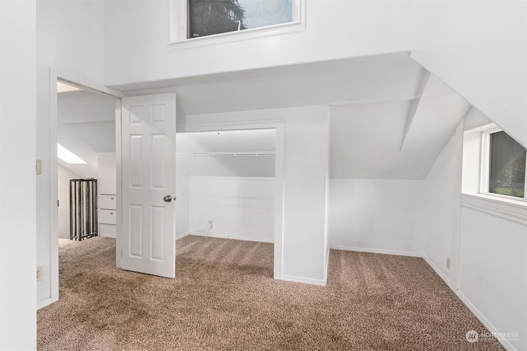 7526 Spada Road Snohomish, WA 98290 - Photo 23 of 40 a view of a big room with closet and windows